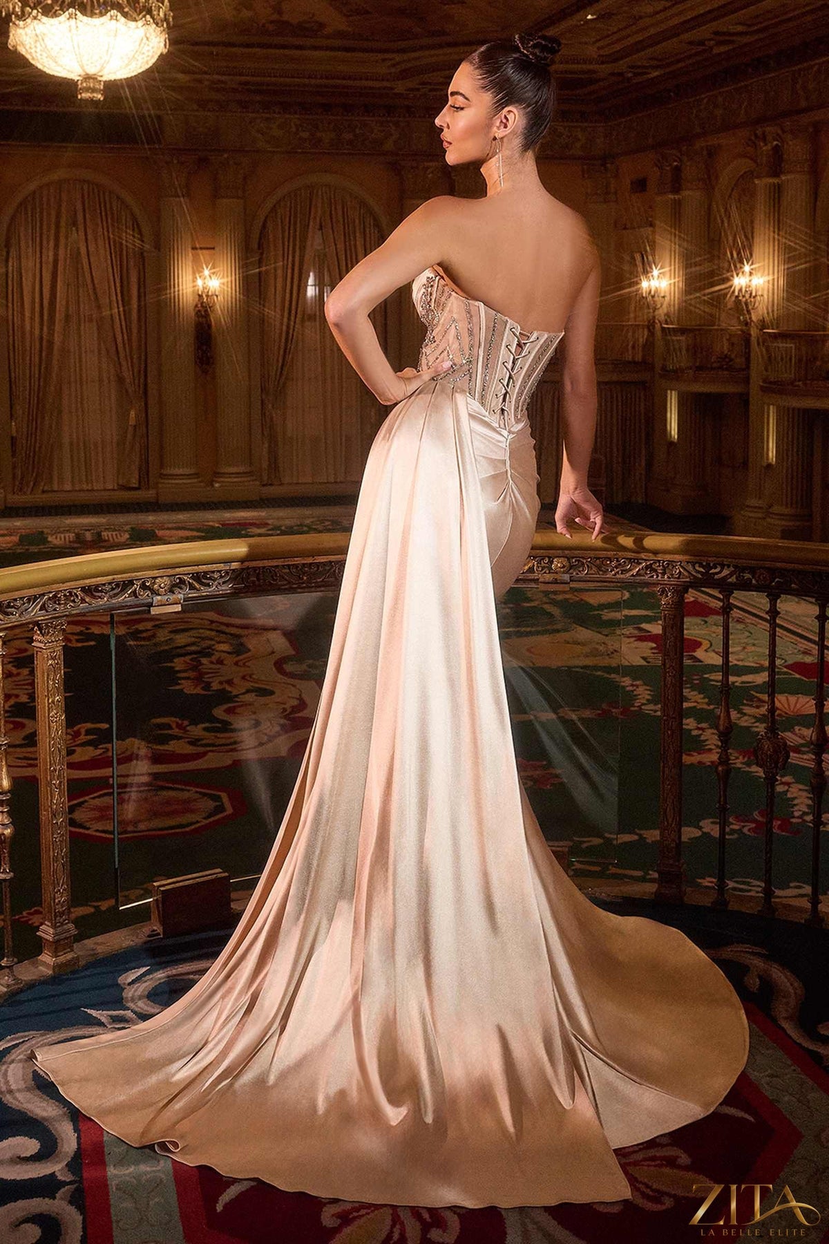 Champagne gold strapless satin fitted gown with side sash by Zita La Belle Elite, front view showing elegant design.