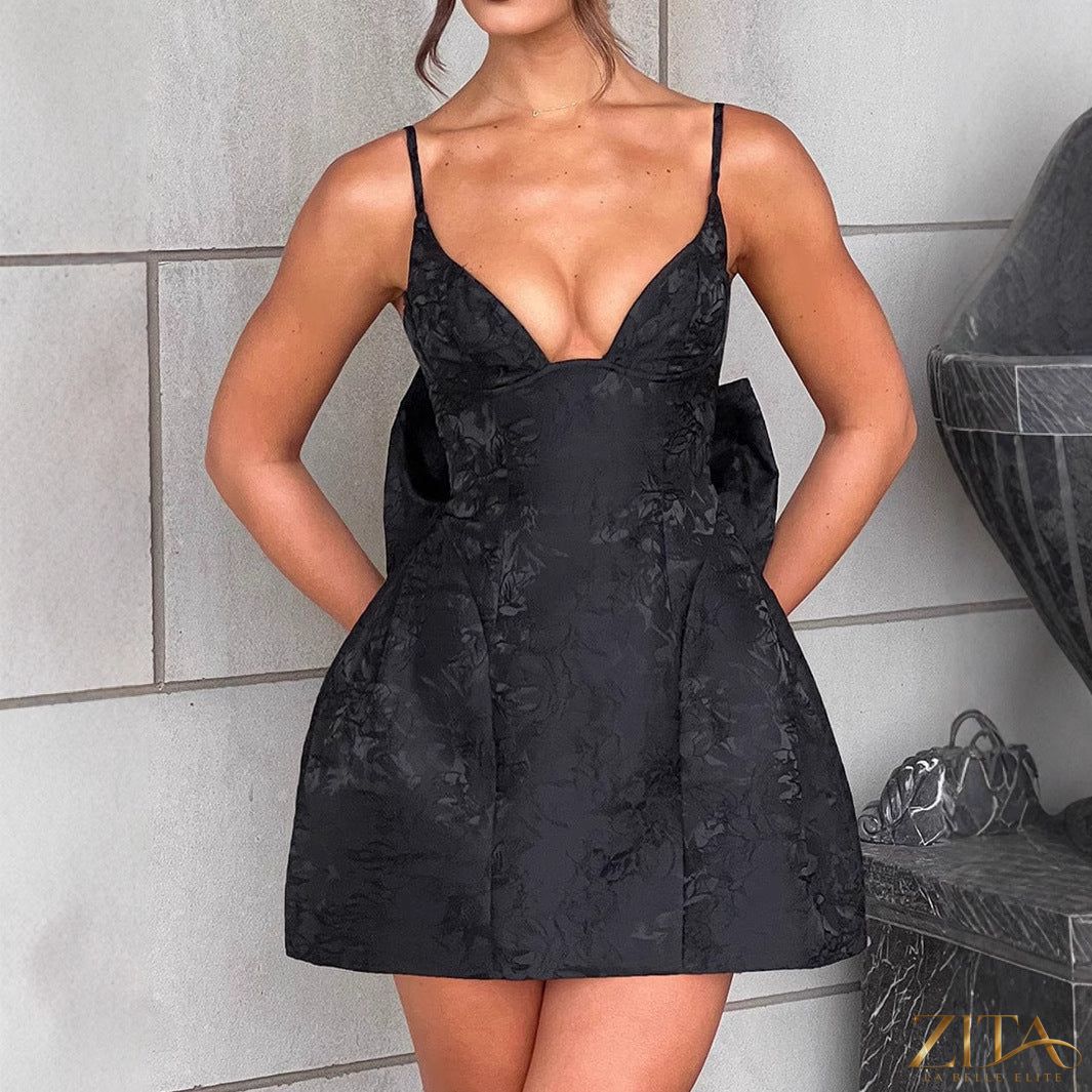 Zita La Belle Elite Bow Strap Short Party Dress with sleeveless design and fitted silhouette on a model.