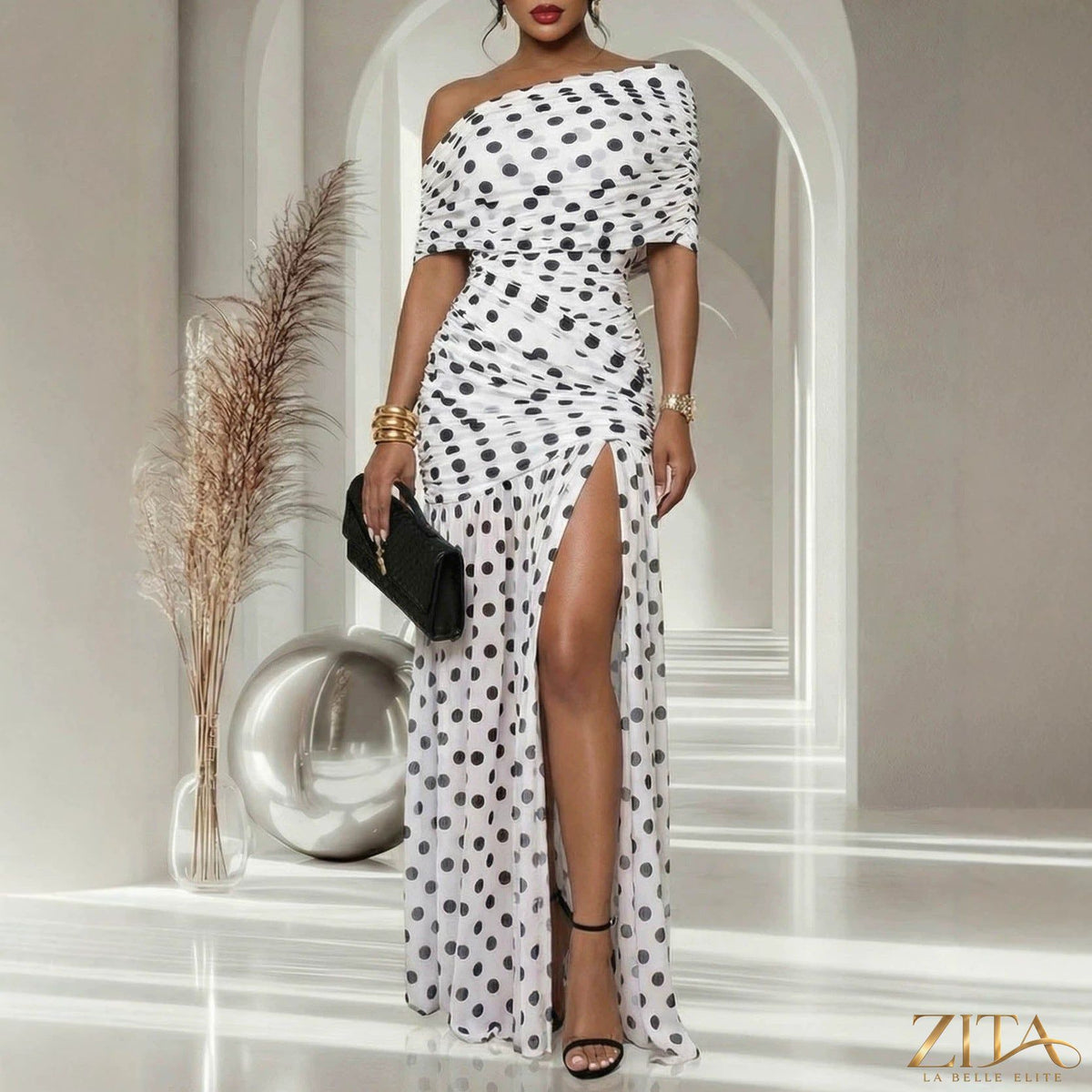 Zita La Belle Elite polka dot cold shoulder slit cocktail dress with long sleeves and flowy skirt, perfect for evening events.