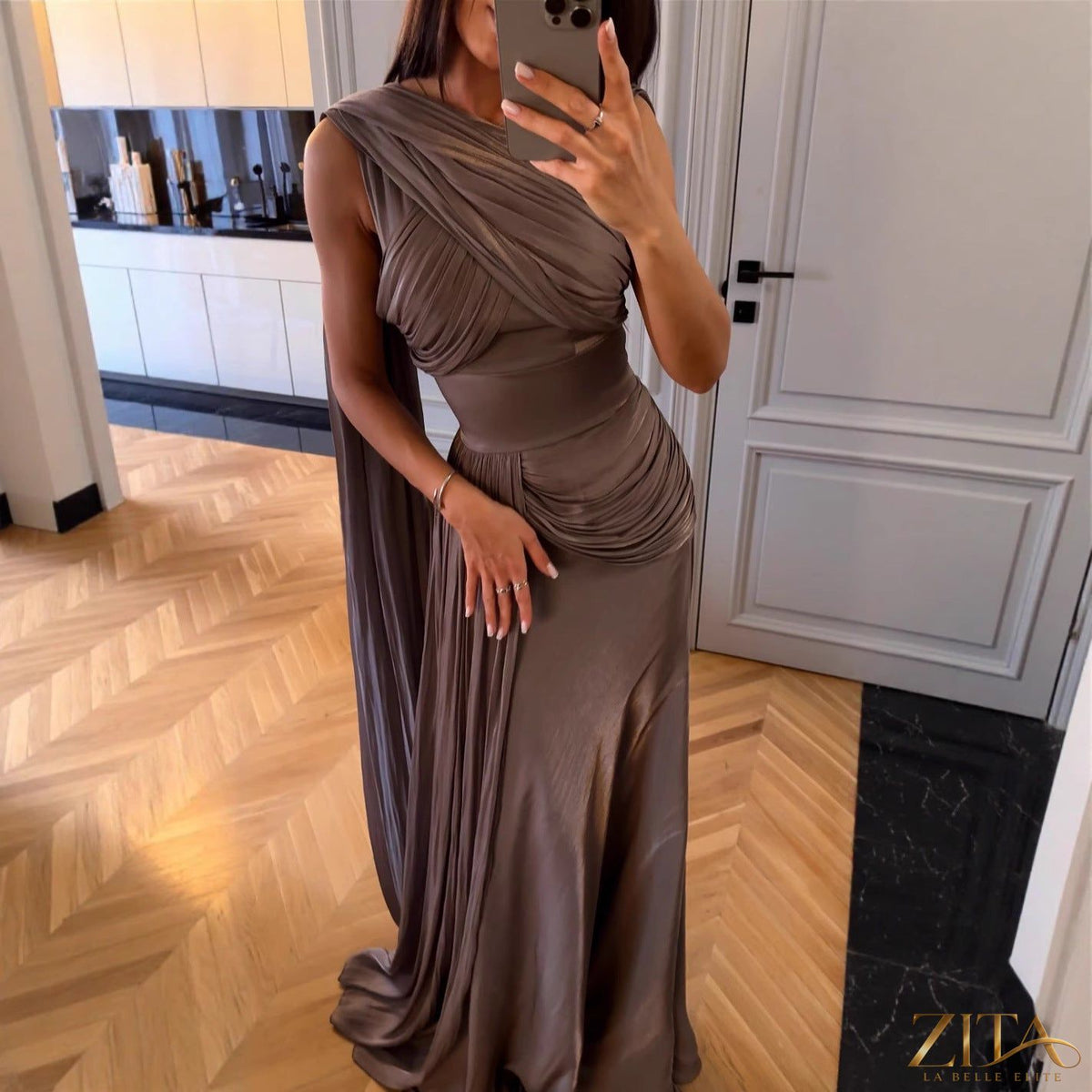 Elegant Zita La Belle Elite satin evening dress with pleats and ribbon details, perfect for spring and summer occasions.