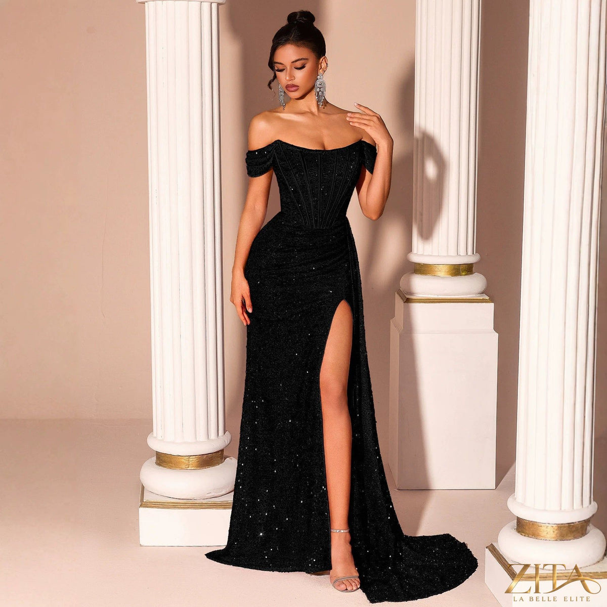 Strapless black sequin fishtail evening dress by Zita La Belle Elite, featuring a fitted bodice and flowing skirt.