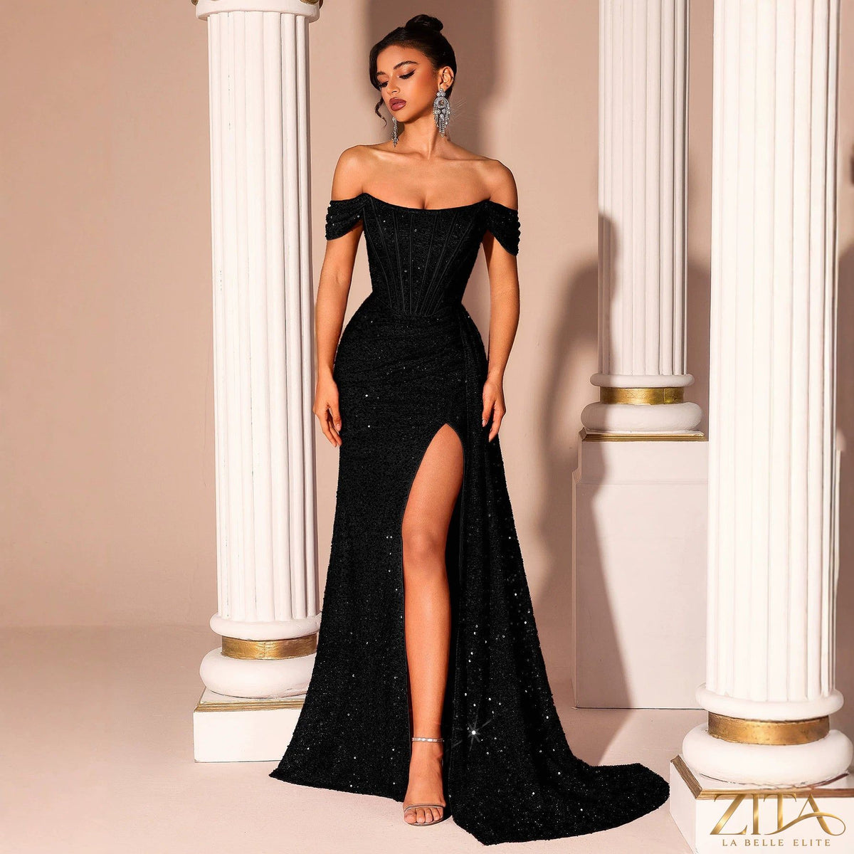 Black sequin strapless fishtail evening dress by Zita La Belle Elite, shown from the front with fitted bodice and flowing skirt.