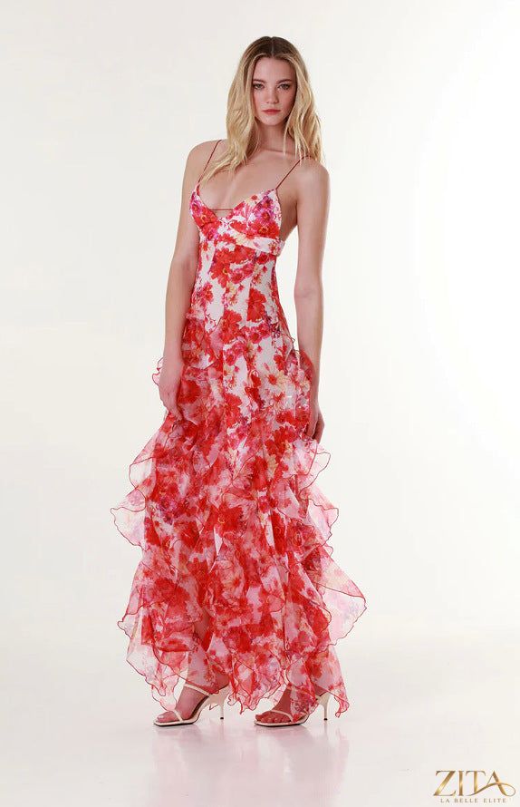 Elegant off-the-shoulder printed chiffon evening gown by Zita La Belle Elite, featuring flowing fabric and a stylish design.