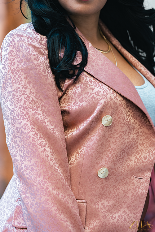 Zita La Belle Elite Premier Blush Blazer shown on a hanger, tailored fit with blush pink fabric and stylish lapel collar.