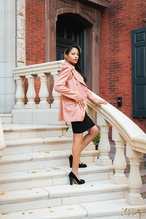Zita La Belle Elite Premier Blush Blazer displayed on a hanger, showcasing its tailored fit and blush pink fabric.