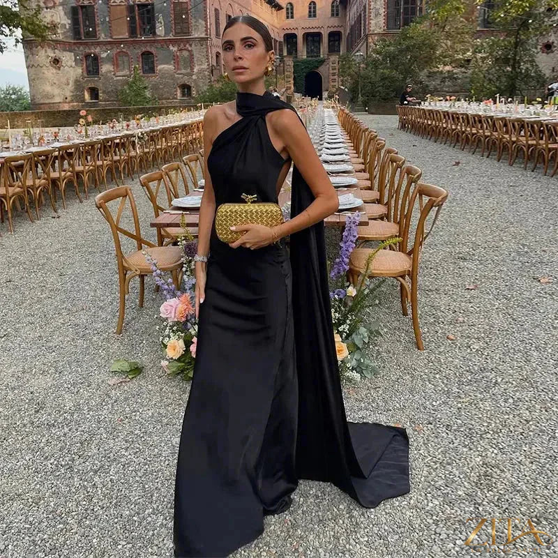Backless lace-up maxi dress by Zita La Belle Elite, sleeveless party gown with ribbon detail and elegant design.