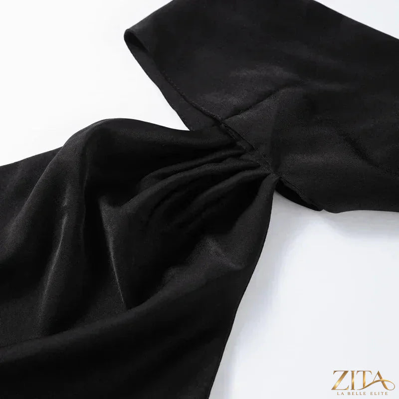 Backless lace-up maxi dress by Zita La Belle Elite, sleeveless evening gown with ribbon detail, perfect for elegant parties.