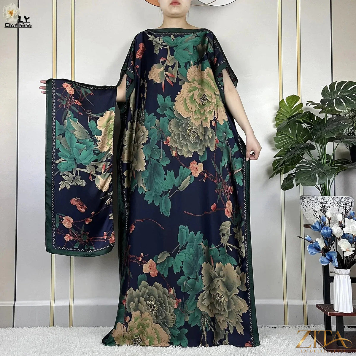 Women’s printed silk loose maxi summer dress with belt and turban from Zita La Belle Elite, featuring vibrant floral patterns and flowing fabric.