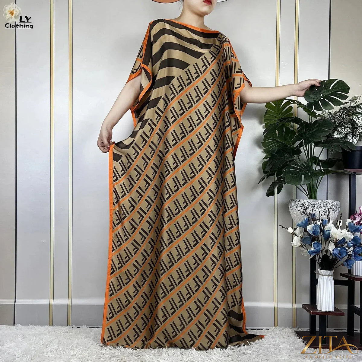 Women’s printed silk maxi party dress with belt and turban by Zita La Belle Elite, featuring a loose, soft, and flowy summer design.
