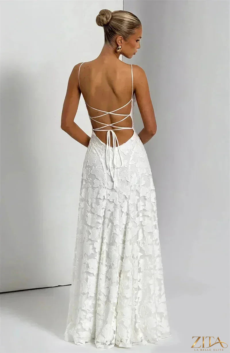 Backless spaghetti strap lace-up maxi evening dress by Zita La Belle Elite, featuring elegant lace details and flowing fabric.