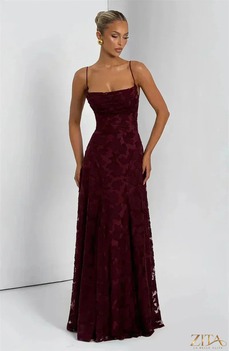 Elegant backless spaghetti strap lace-up maxi evening dress for women by Zita La Belle Elite, showcasing a flowing gown with stylish details.