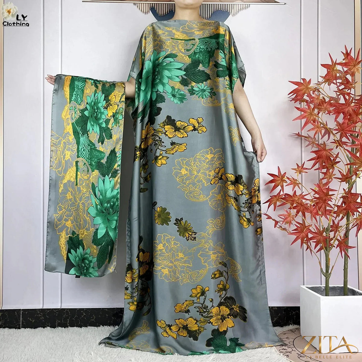 Women’s loose silk maxi dress with printed design, belt, and turban from Zita La Belle Elite, perfect for summer parties.