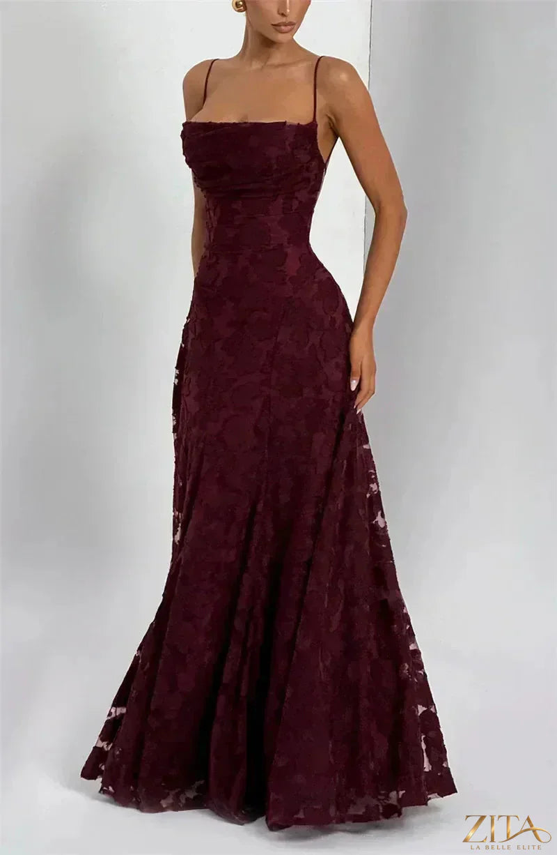 Backless spaghetti strap lace-up maxi evening dress by Zita La Belle Elite, featuring elegant design and flowing fabric.