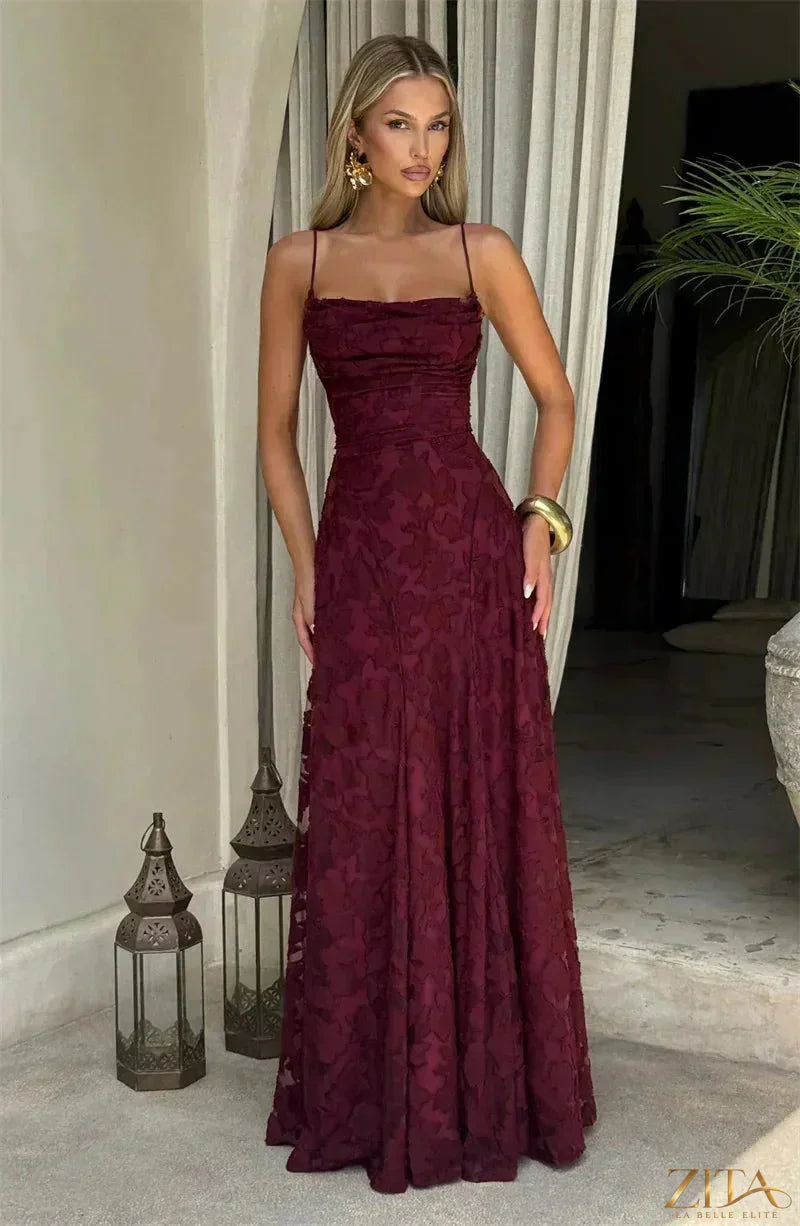 Elegant backless spaghetti strap lace-up maxi evening dress for women by Zita La Belle Elite, featuring flowing fabric and stylish design.