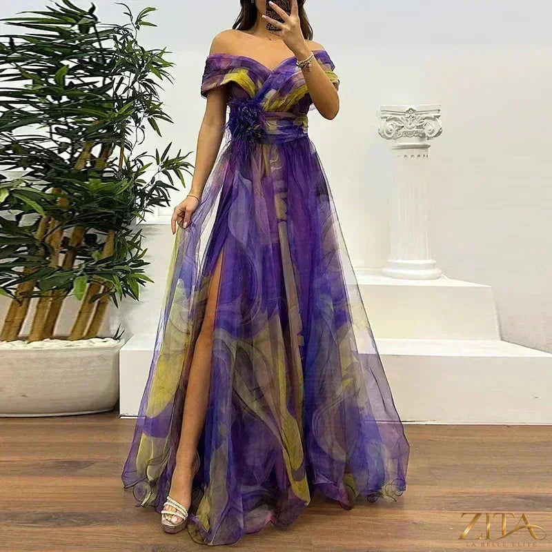 Elegant one-shoulder pleated evening dress with slit by Zita La Belle Elite, showcased on a model in a formal setting.