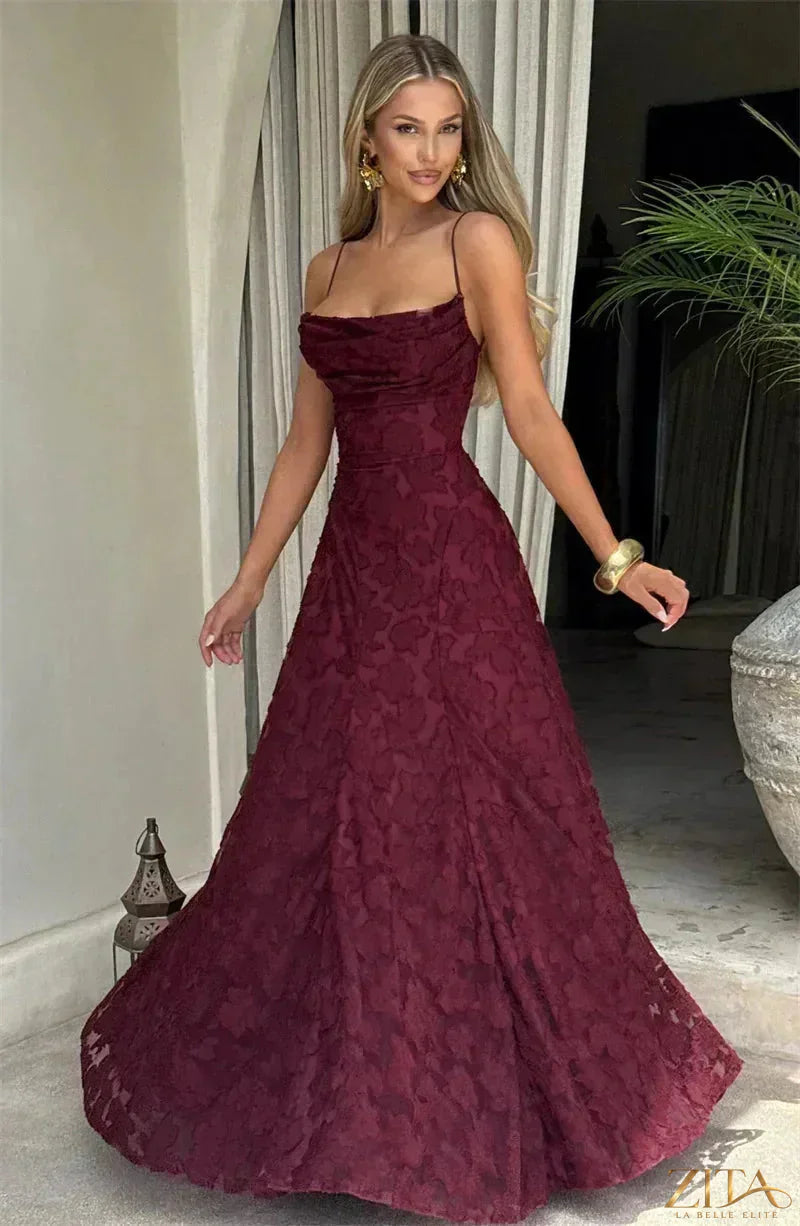 Backless spaghetti strap lace-up maxi evening dress by Zita La Belle Elite, featuring elegant lace details and a flowing silhouette.