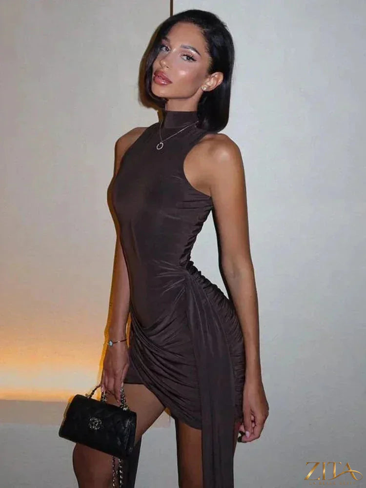 Zita La Belle Elite sleeveless turtleneck mini dress with ruched, asymmetrical design, perfect for party or evening events.