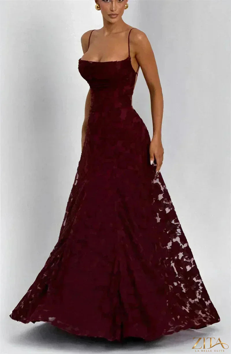 Elegant backless spaghetti strap lace-up maxi evening dress for women by Zita La Belle Elite, featuring flowing fabric and stylish design.
