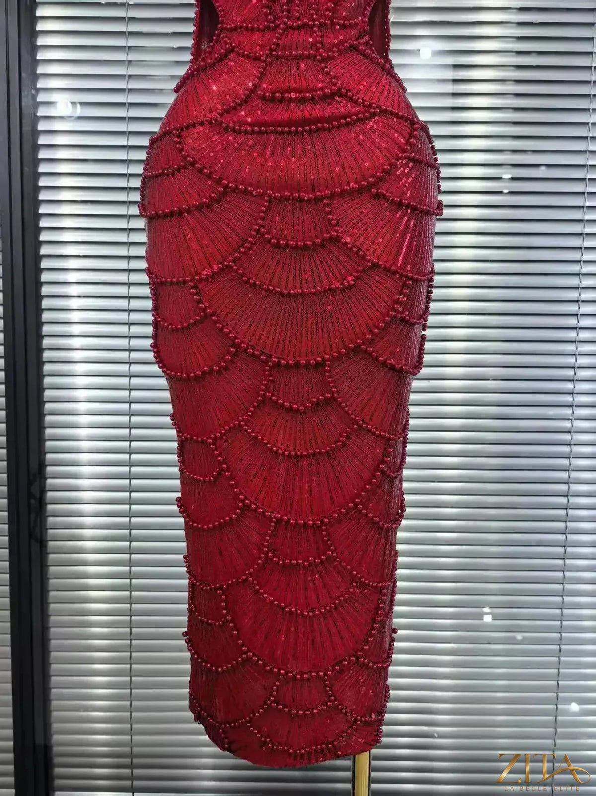 Pearl beaded sleeveless Christmas party dress by Zita La Belle Elite, bodycon fit with elegant festive detailing.