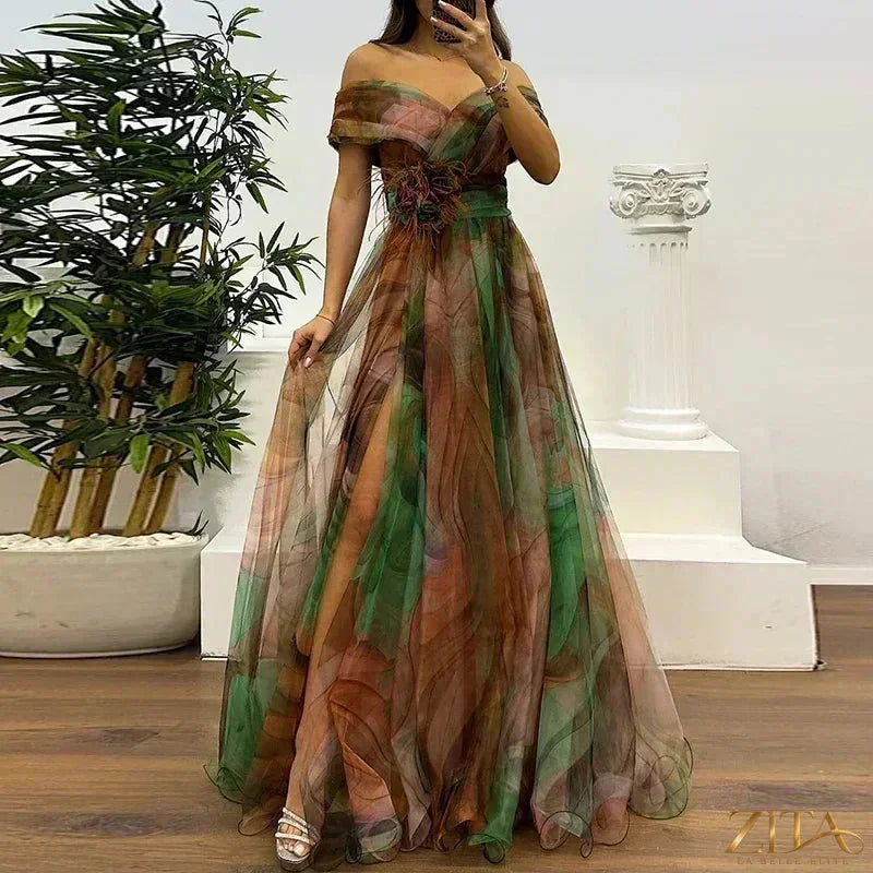 Elegant one-shoulder pleated gala evening dress with a slit by Zita La Belle Elite, featuring flowing fabric and sophisticated design.