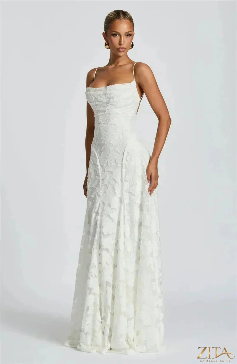 Elegant backless spaghetti strap lace-up maxi evening dress for women by Zita La Belle Elite, featuring flowing fabric and a stylish silhouette.