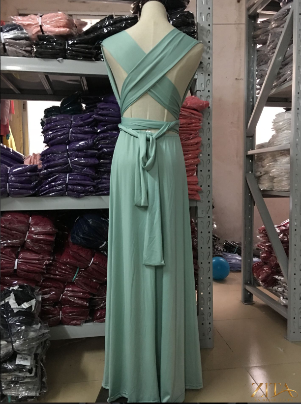 Women’s red bandage evening dress with multiple rope details by Zita La Belle Elite, featuring a long, form-fitting design.