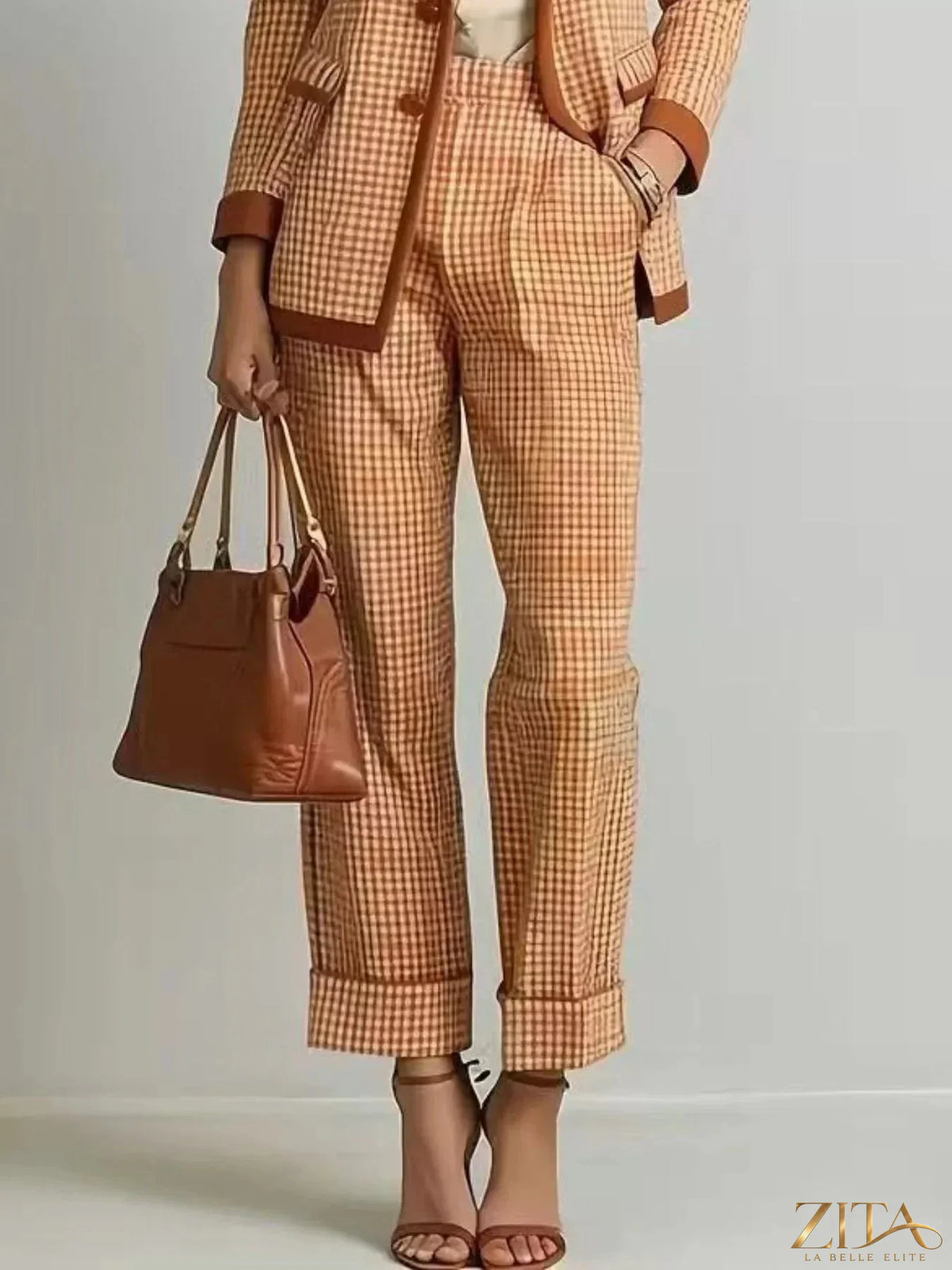Zita La Belle Elite plaid blazer and pants suit set displayed on a model, featuring a classic checkered pattern and tailored fit.