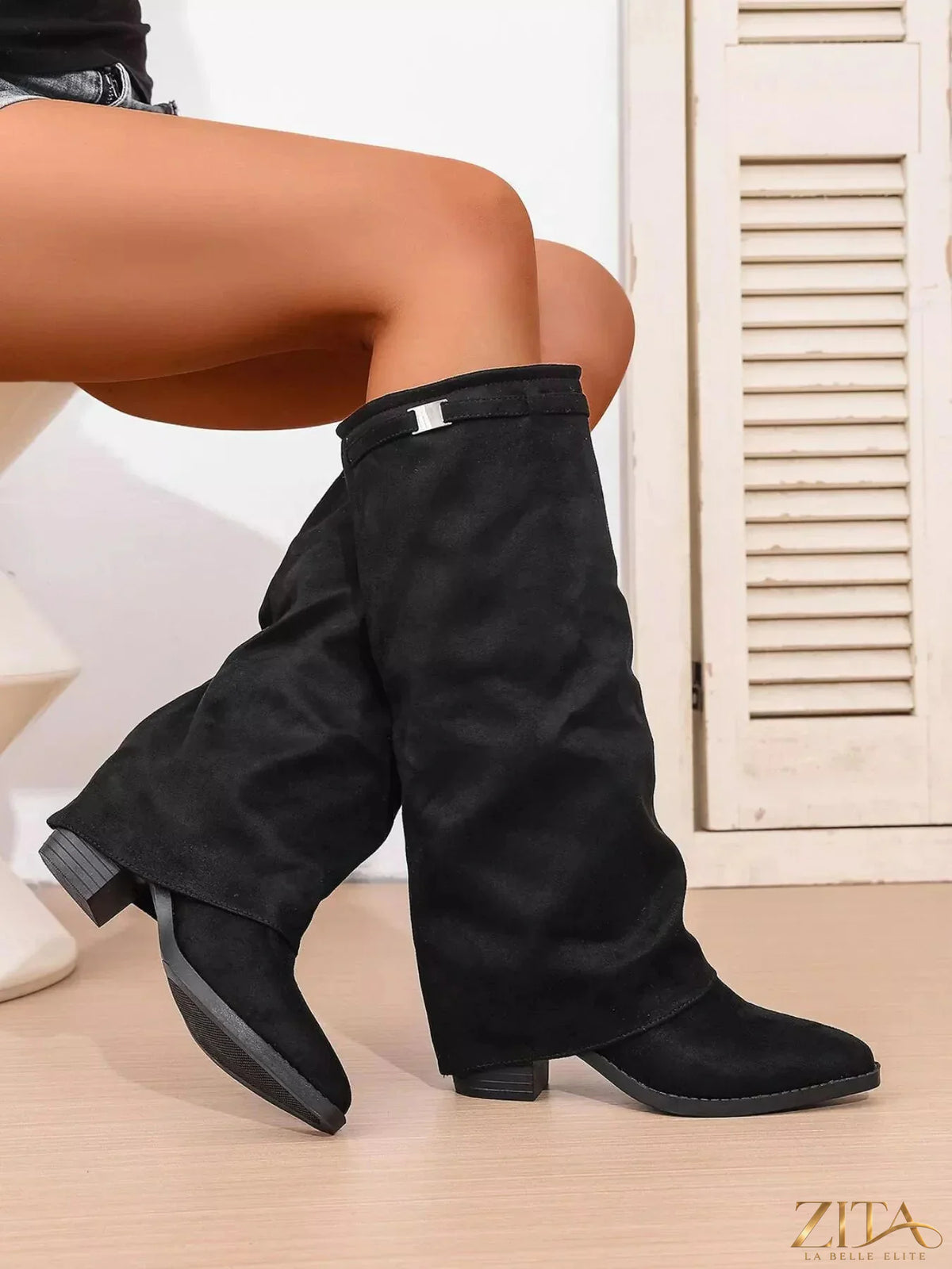 Zita La Belle Elite point toe block heel boots in black leather, featuring sleek design and ankle height with stylish stitching details.