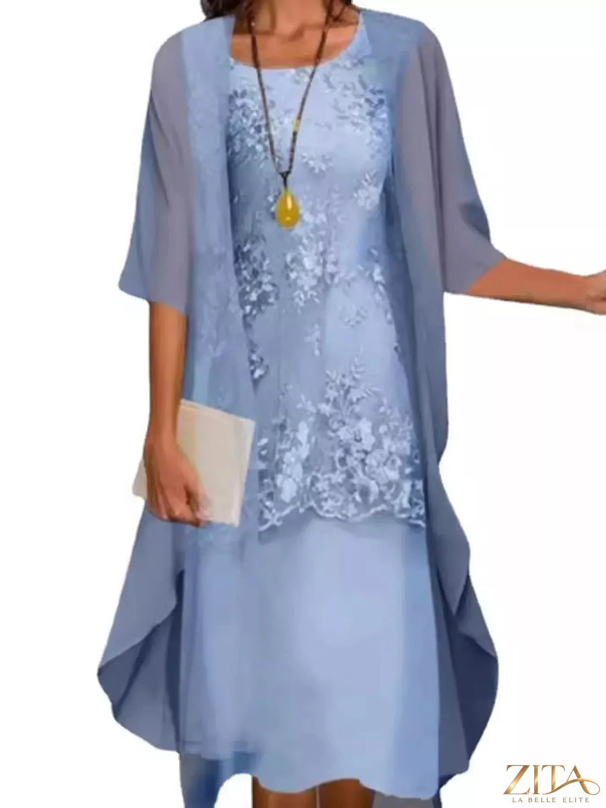 Plus size elegant lace overlay dress with matching chiffon cardigan set by Zita La Belle Elite, shown on a model.