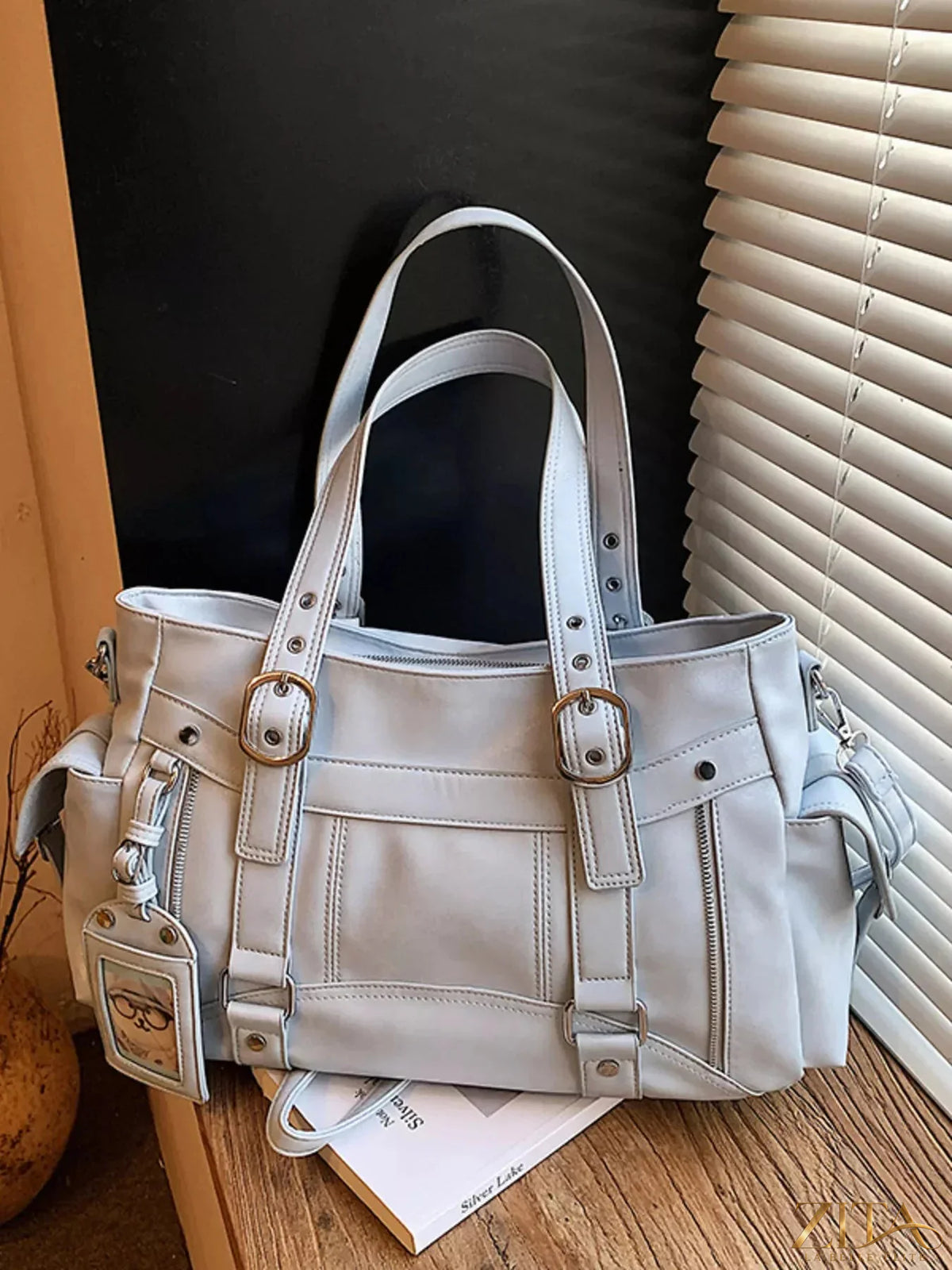 Zita La Belle Elite buckle decor shoulder bag with stylish design and adjustable strap, featuring a sleek, modern look.