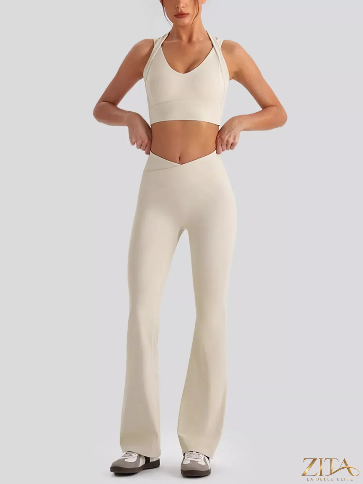 Seamless criss-cross V-neck tank top and matching leggings from Zita La Belle Elite, designed for active wear and movement.