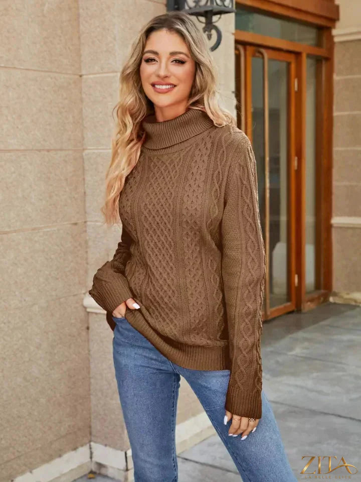 Zita La Belle Elite cable-knit mock neck sweater in neutral color, close-up of textured knit fabric and high neckline.