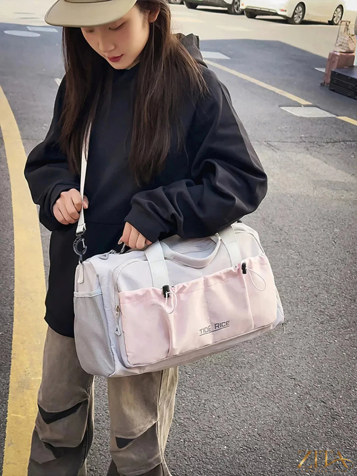 Zita La Belle Elite drawstring travel bag with multiple pockets, lightweight and spacious for organizing travel essentials.