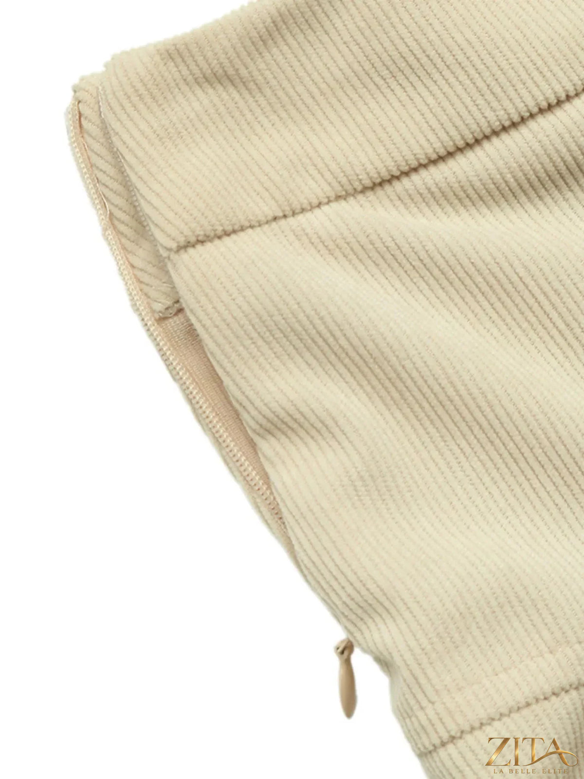 Zita La Belle Elite high waist pleated midi skirt in a flowing fabric, shown in a stylish side view.