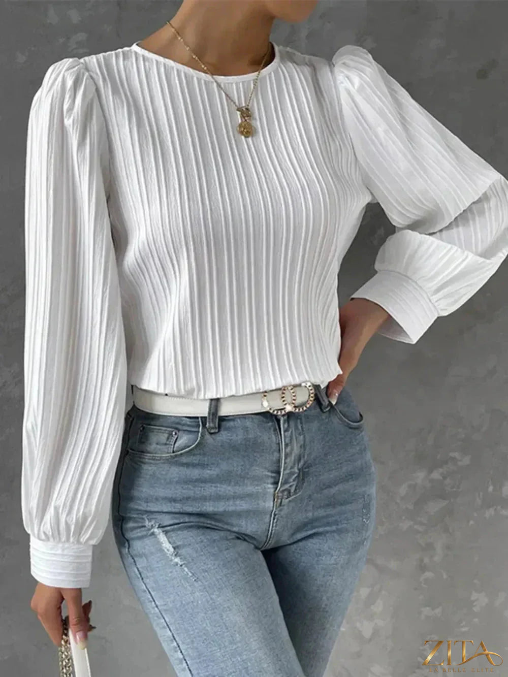 Zita La Belle Elite round neck long sleeve blouse in soft fabric, shown on a hanger with a neutral background.