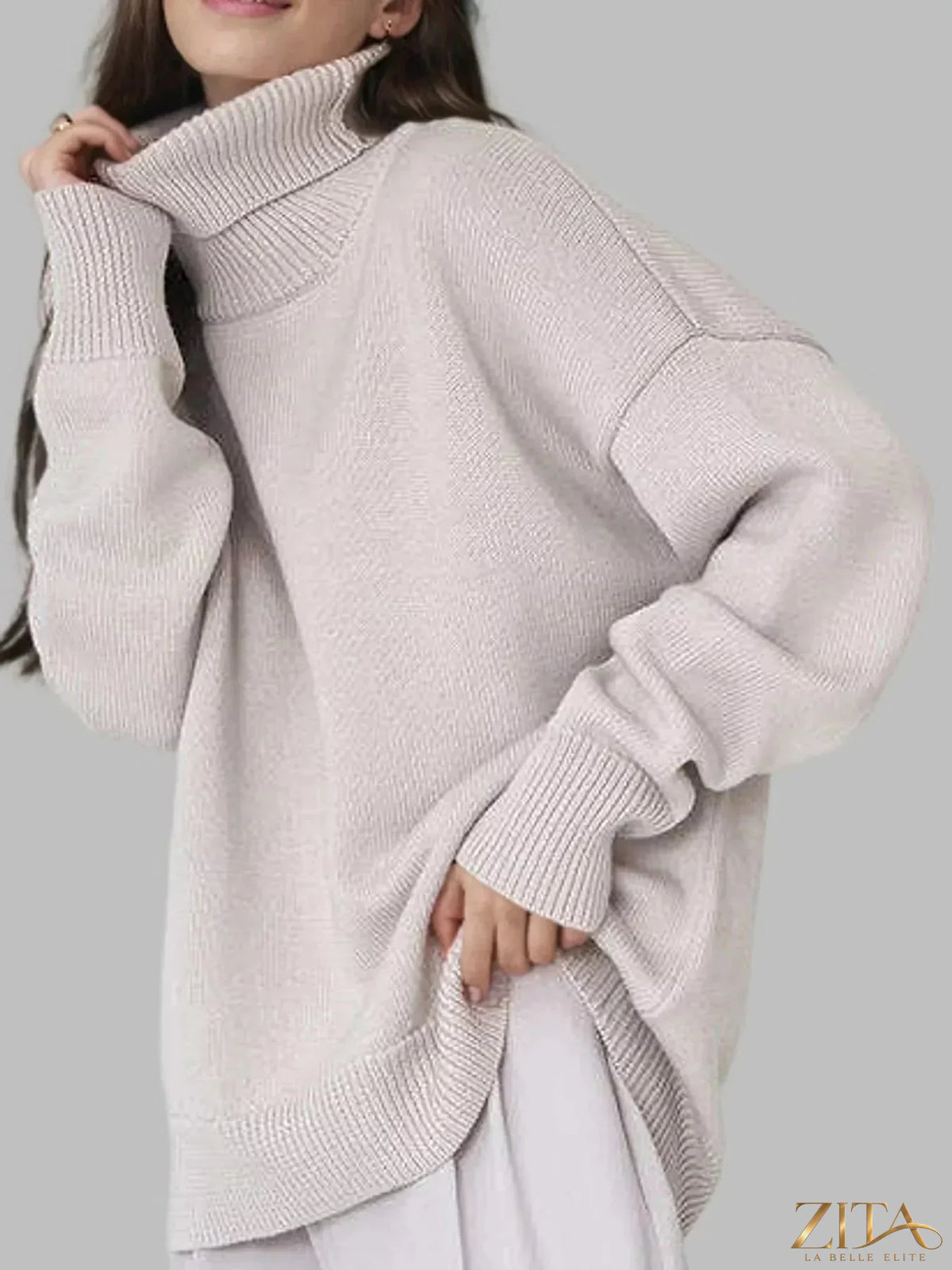 Zita La Belle Elite turtleneck dropped shoulder sweater in soft knit, showcasing its relaxed fit and cozy design.