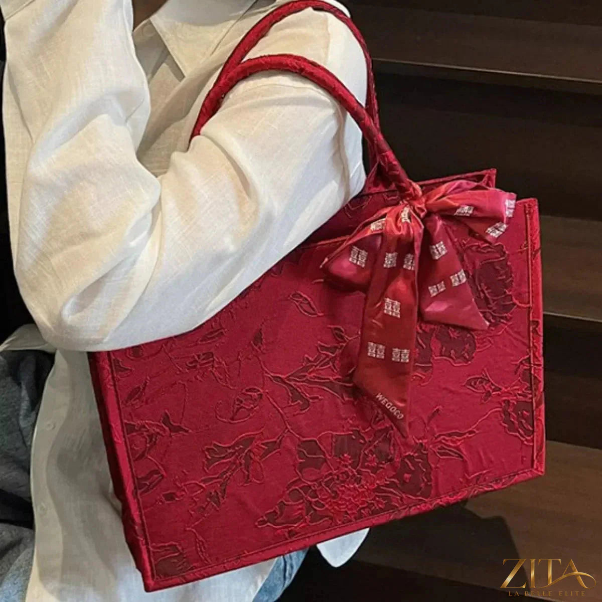 Zita La Belle Elite floral embossed tote handbag with a scarf accent, showcasing elegant textured leather and stylish design.