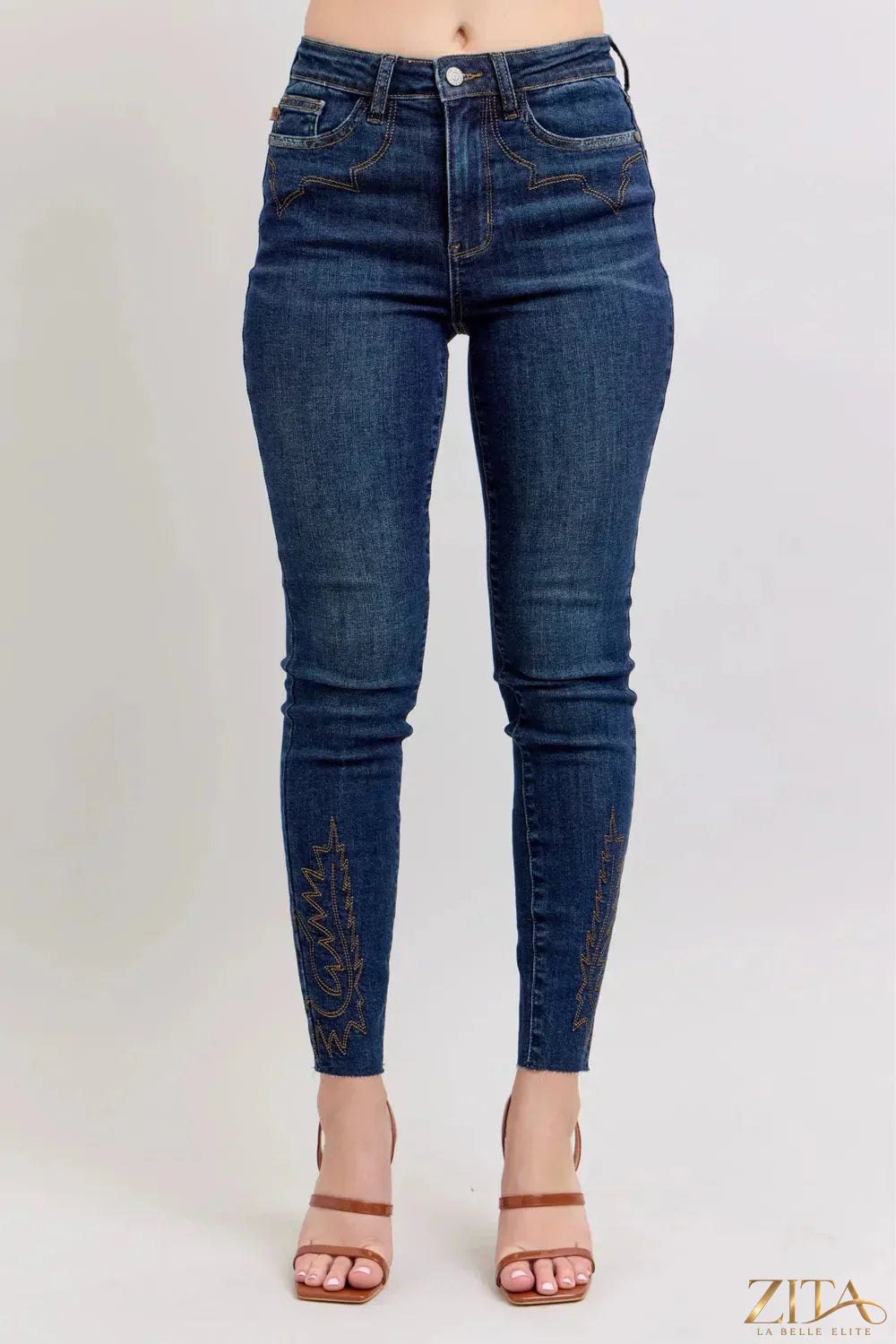 Plus size Judy Blue high rise skinny jeans with embroidered details, showcasing a flattering fit and stylish design.