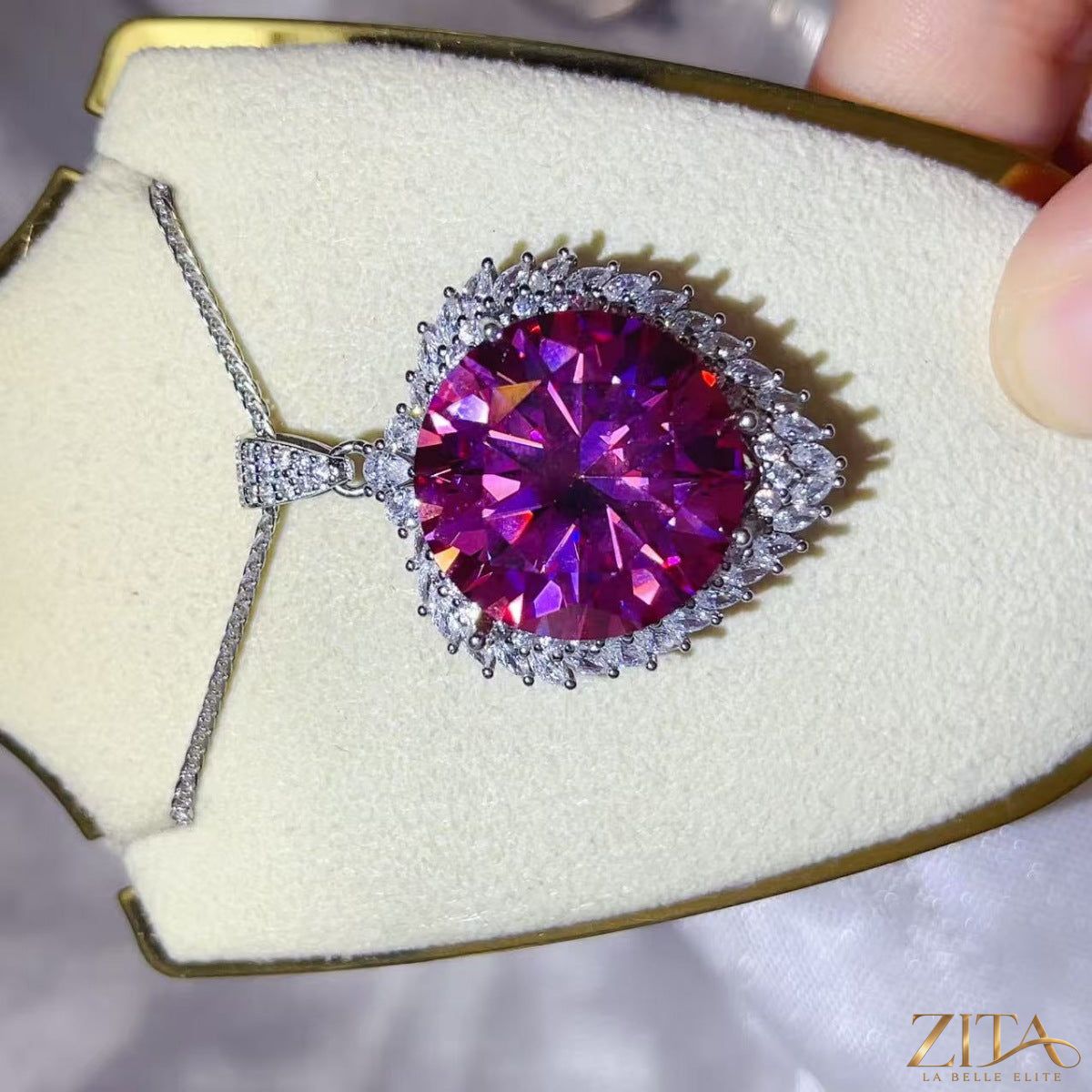 Sterling silver pendant necklace with a 20 carat moissanite gemstone, elegant jewelry piece with a sleek chain.