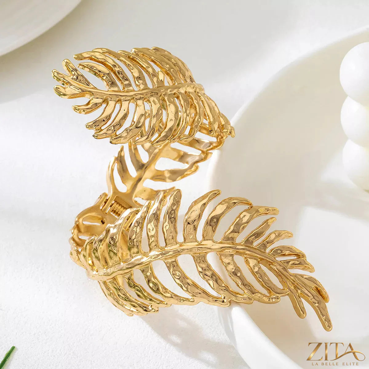 18K gold-plated alloy leaf bracelet by Zita La Belle Elite featuring delicate leaf charms and elegant design.