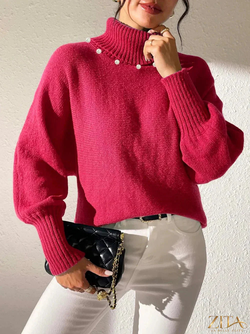 Zita La Belle Elite long sleeve turtleneck sweater in cozy knit fabric, close-up of the beige sweater on a model.