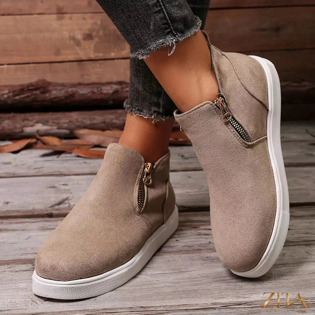 Zita La Belle Elite side zipper flat sneakers in white with black accents, featuring a sleek design and comfortable flat sole.