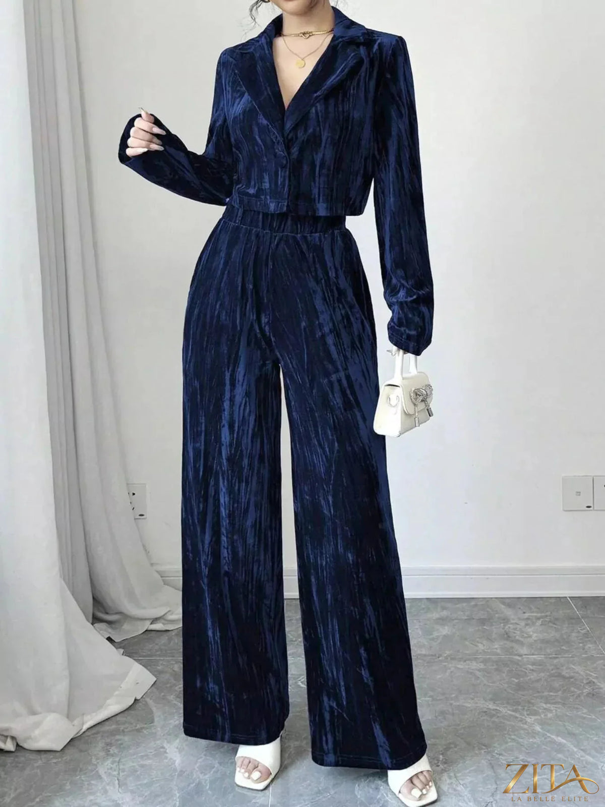 Zita La Belle Elite pleated velvet blazer and wide-leg pants set, featuring elegant tailored fit and rich fabric detail.