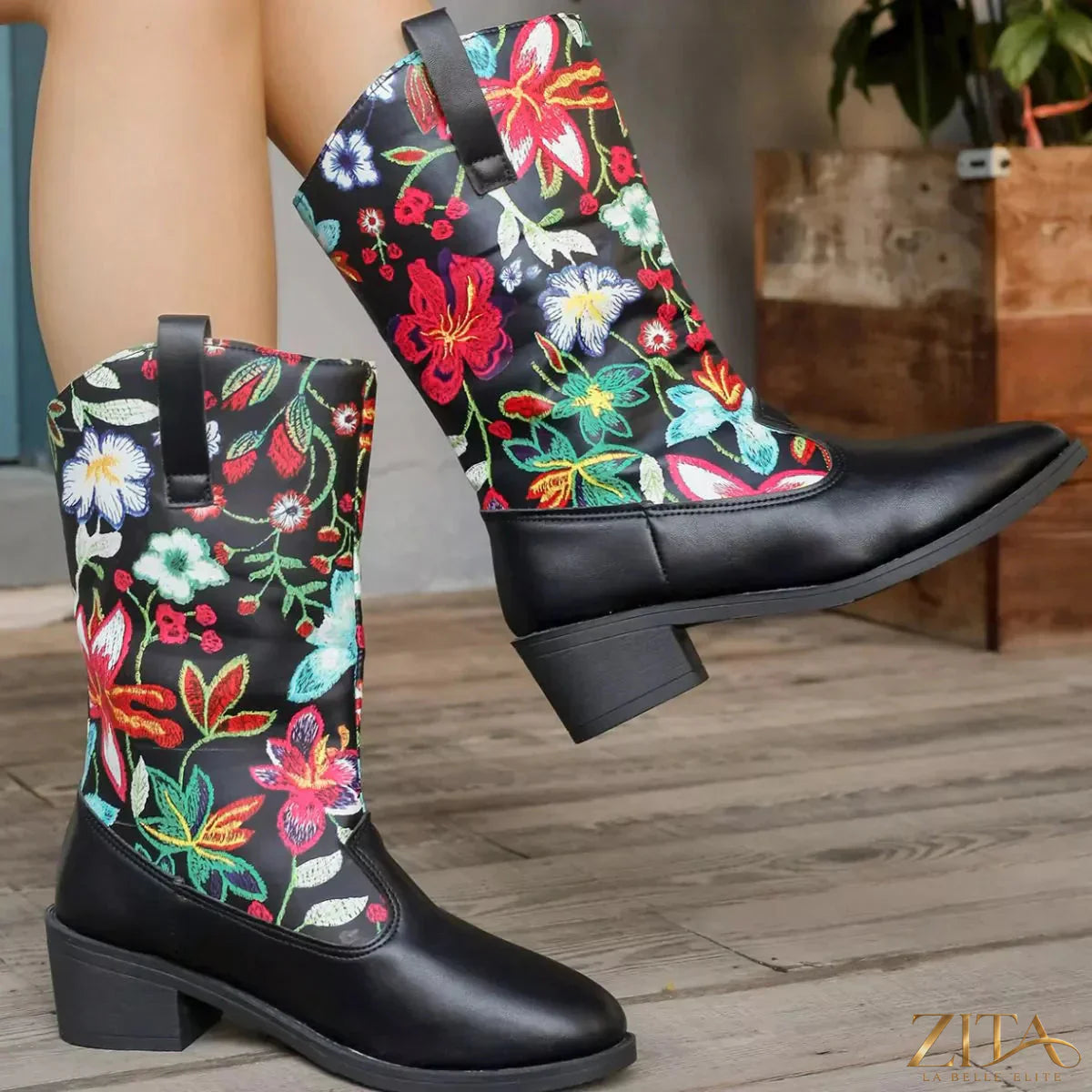 Floral block heel boots by Trendsi featuring a vibrant floral pattern and chunky heel, perfect for stylish fall or spring outfits.