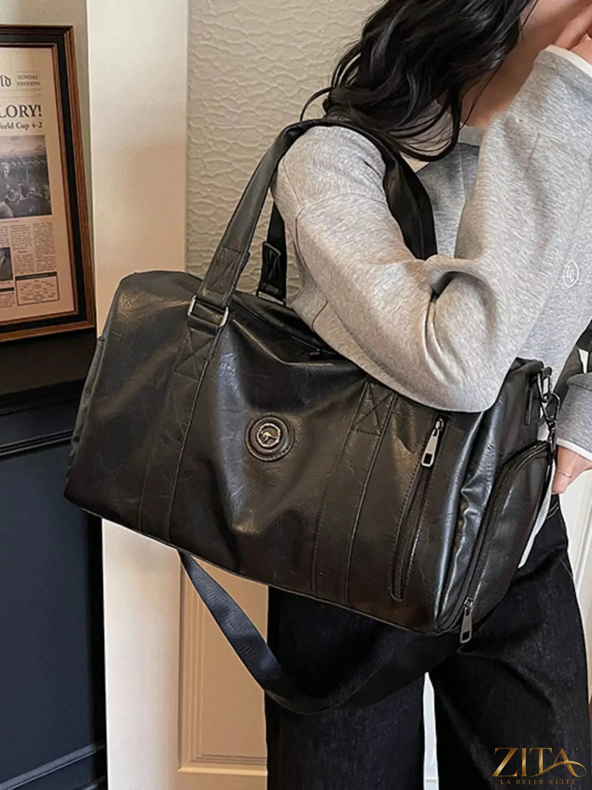 Trendsi PU leather duffel bag with sturdy handles and spacious main compartment, ideal for travel and gym use.