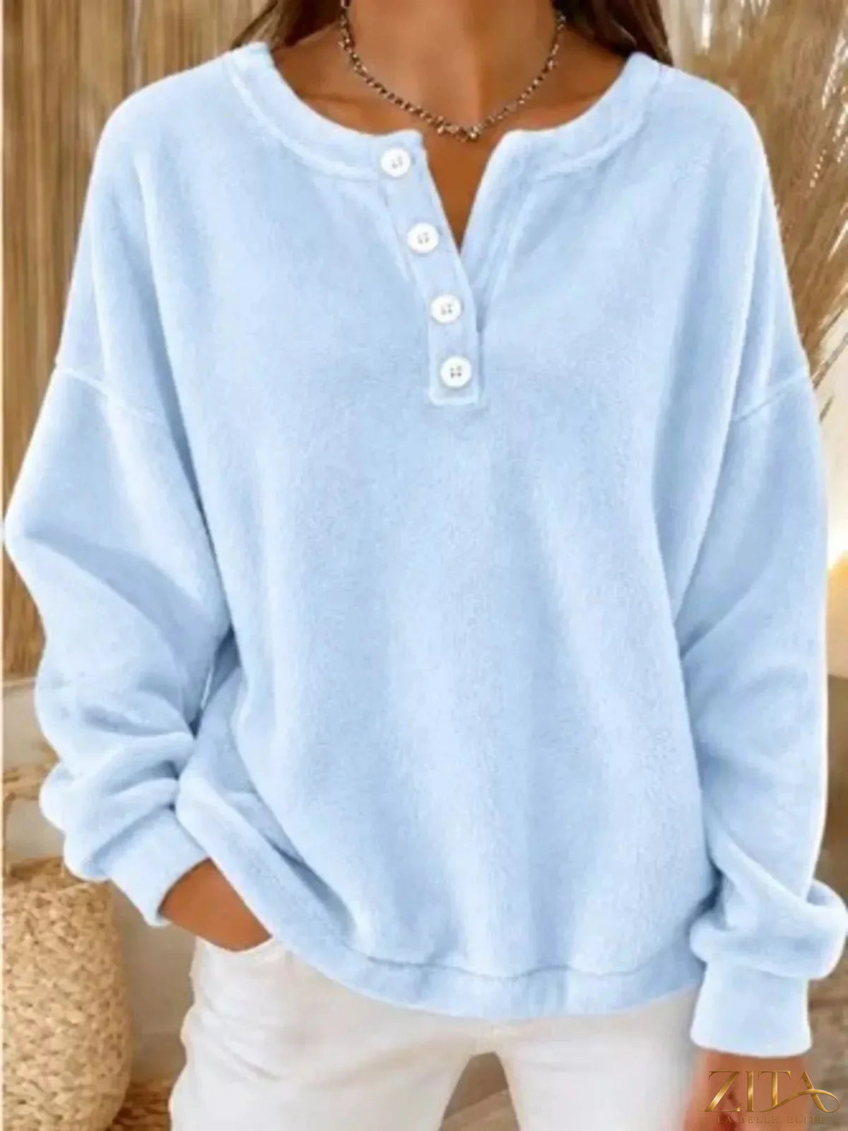 Zita La Belle Elite button detail dropped shoulder sweatshirt showing soft fabric, relaxed fit, and stylish design.