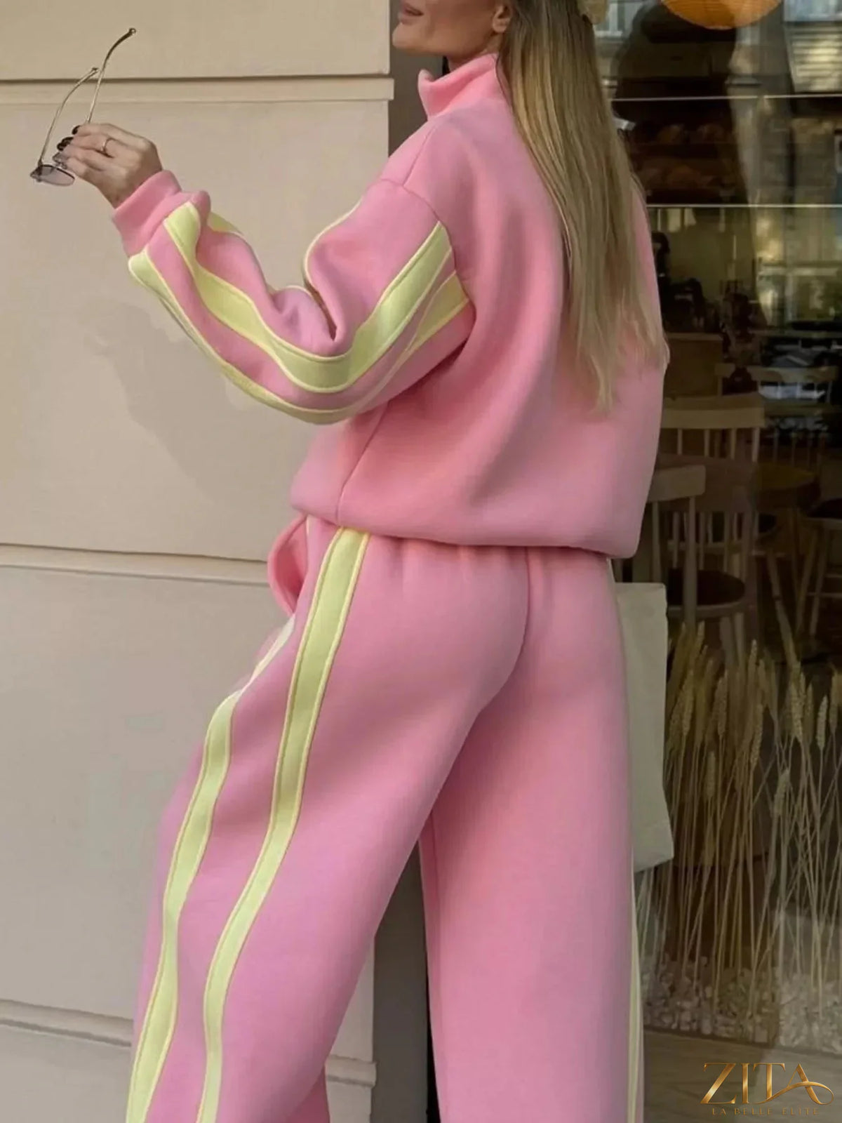 Zita La Belle Elite contrast striped zip-up top and matching pants set, featuring bold color blocks and a sporty style.
