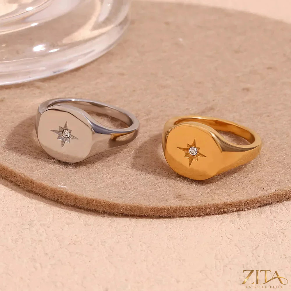 Minimalist North Star signet ring by Zita La Belle Elite, featuring a sleek band with a star-shaped engraved design.