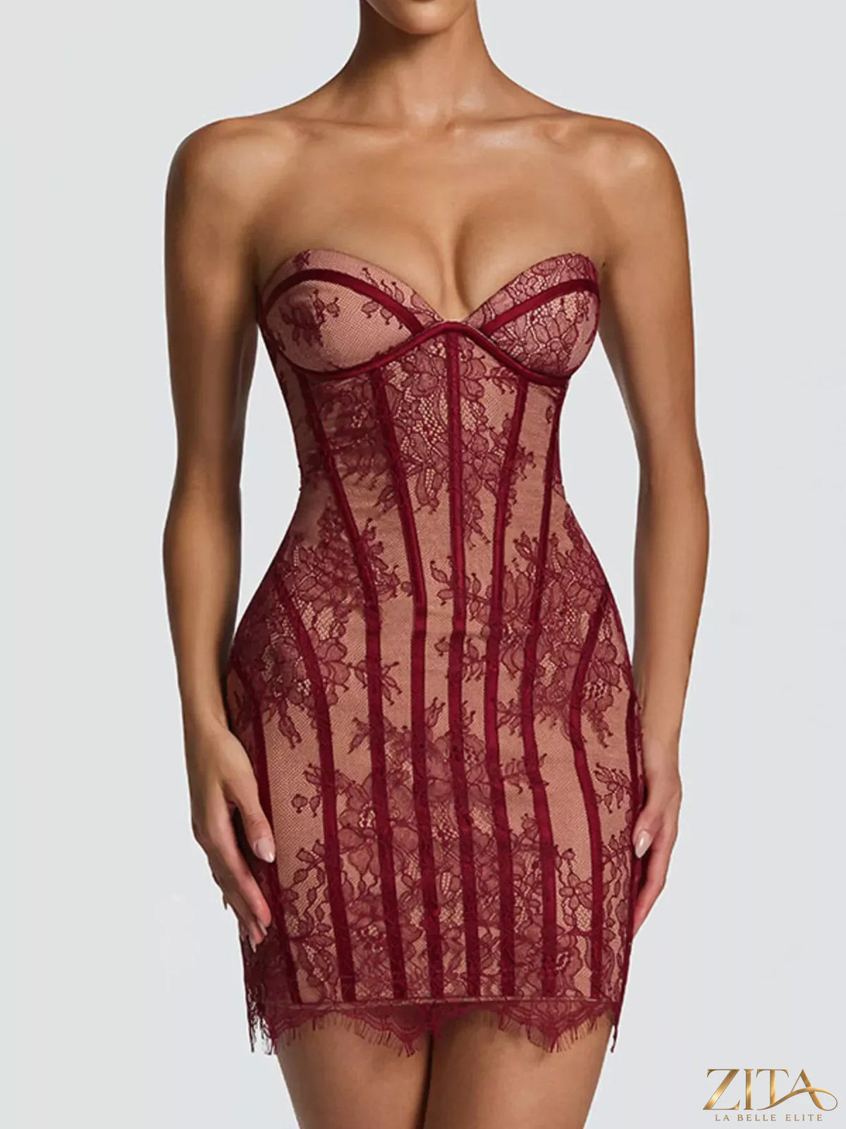 Lace detail tube mini dress in black from Trendsi, close-up of the fitted dress with intricate lace accents on the neckline.