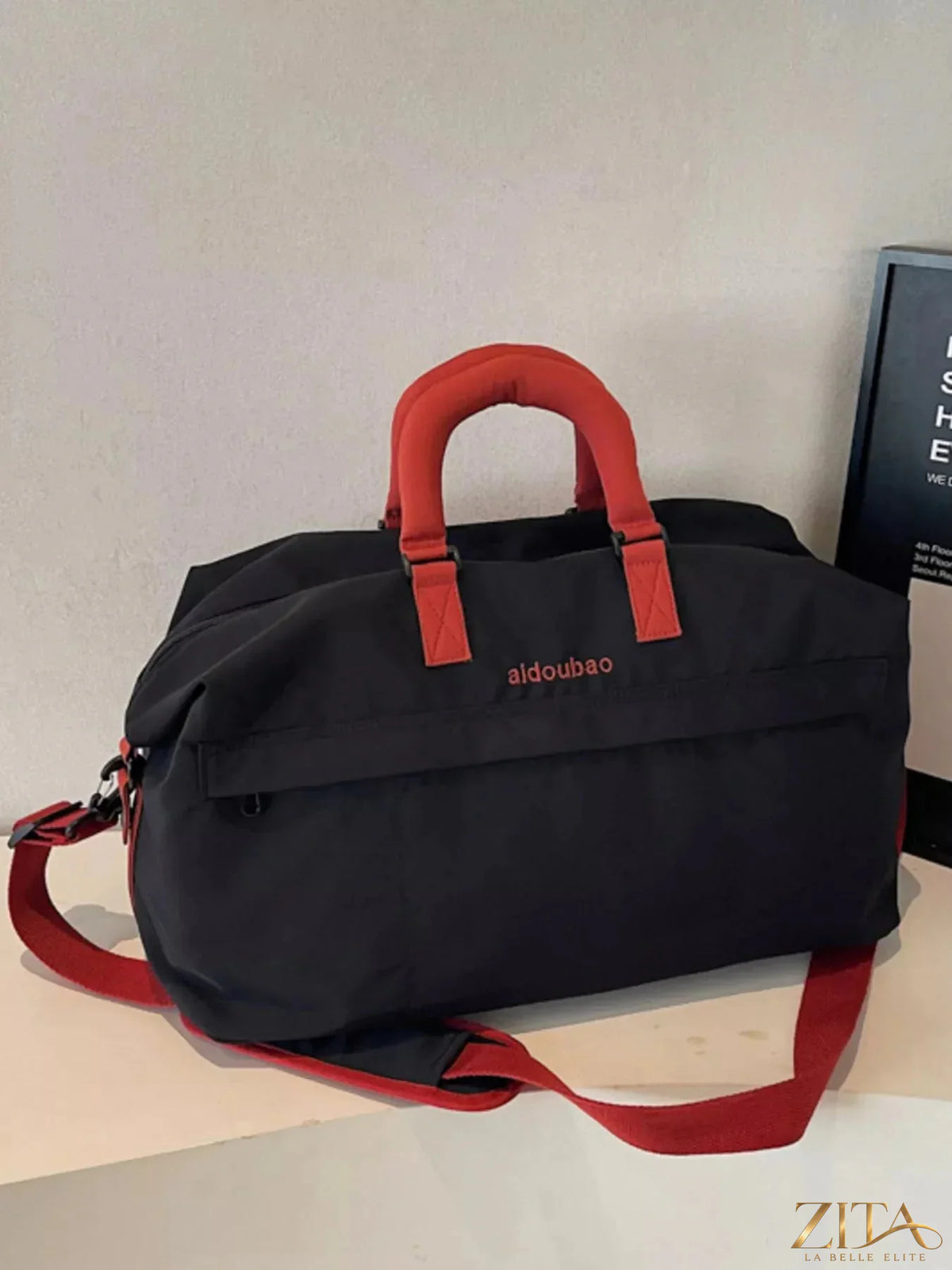 Lightweight Zita La Belle Elite travel bag with large capacity, shown with multiple compartments and sturdy handles for easy carrying.